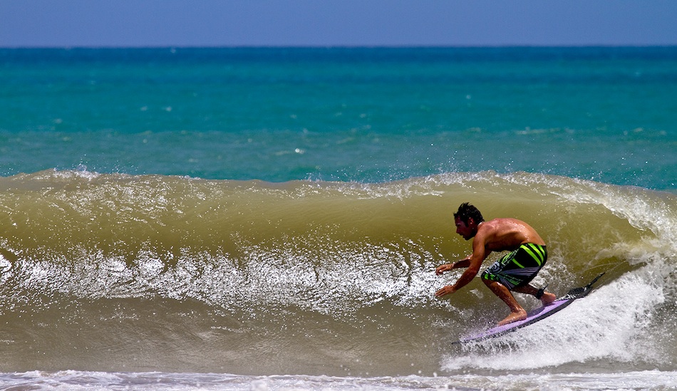 Emiliano Cataldi lines up a barrel section at the consistent river mouth break of Chevalier, west of Port Salut.  Photo: John Seaton Callahan.